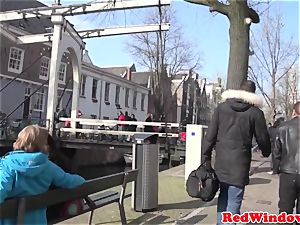 Amsterdam escort sucks client